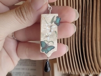 Boucles &ldquo;papillon&rdquo;